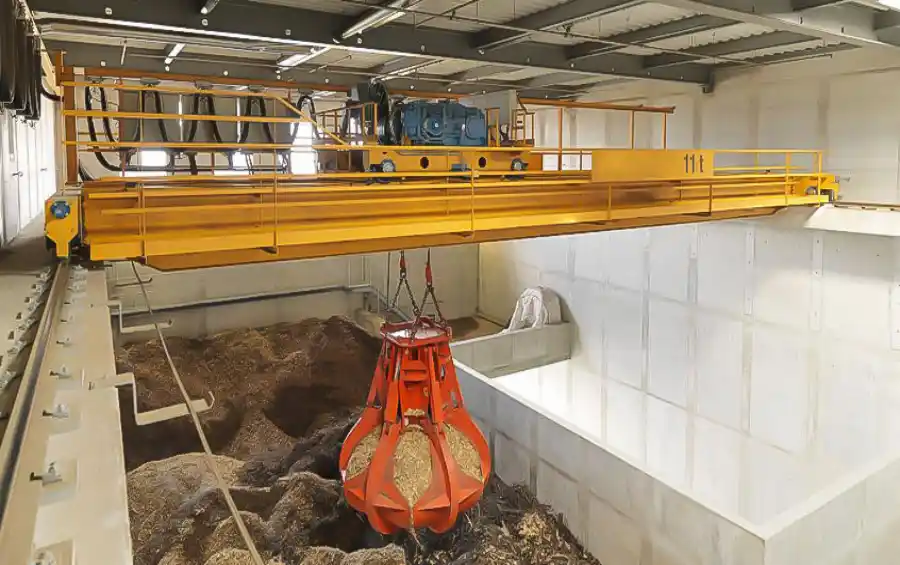 Crane Industry News: Grab Bucket Overhead Crane: Efficient Handling for Bulk Materials